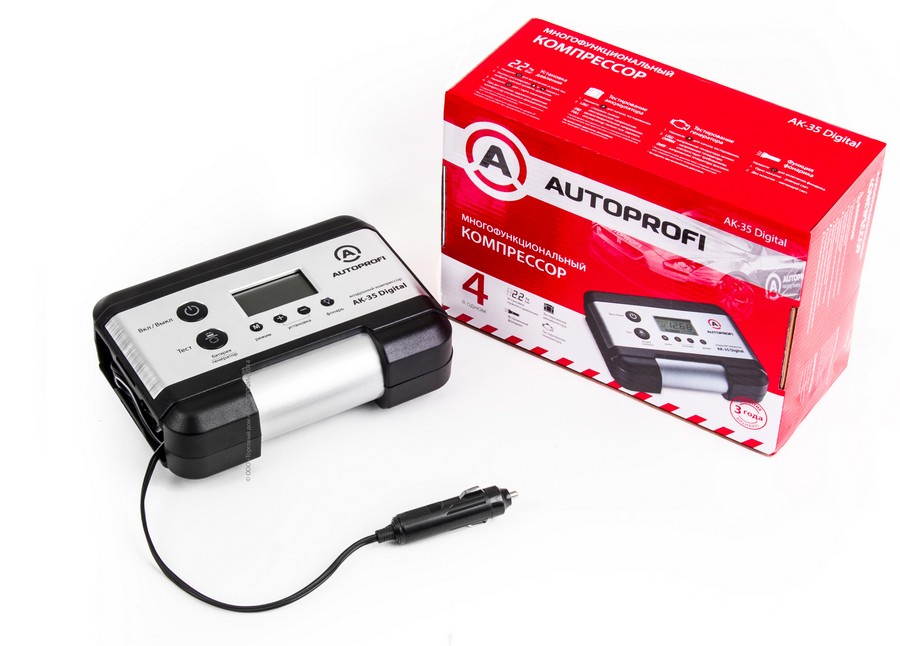 Компрессор для шин рядом со своей упаковкой